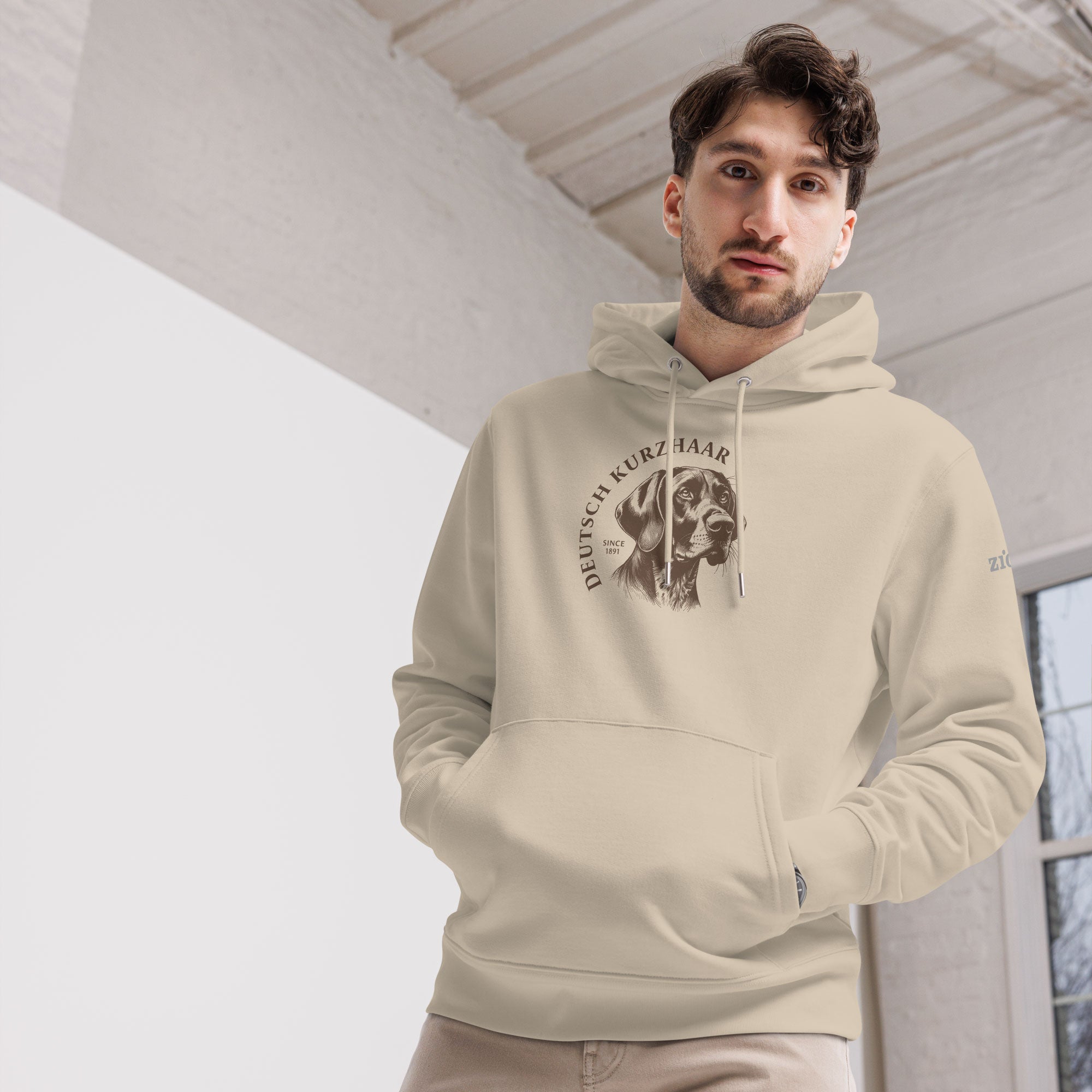 Man wearing a Deutsch Kurzhaar Hoodie in Desert Dust/ Beige by ZIO