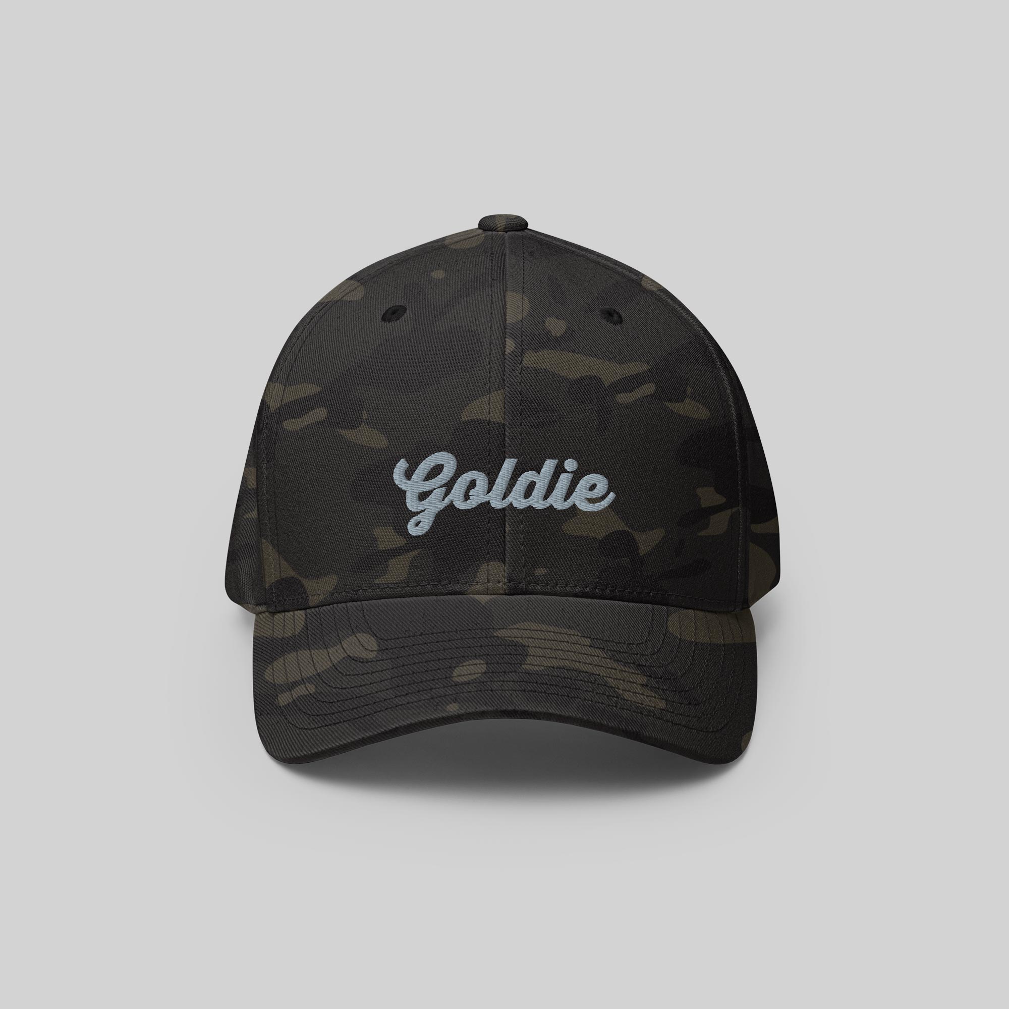 Goldie Signature Cap by ZIO in multicam, “Goldie” embroidered.