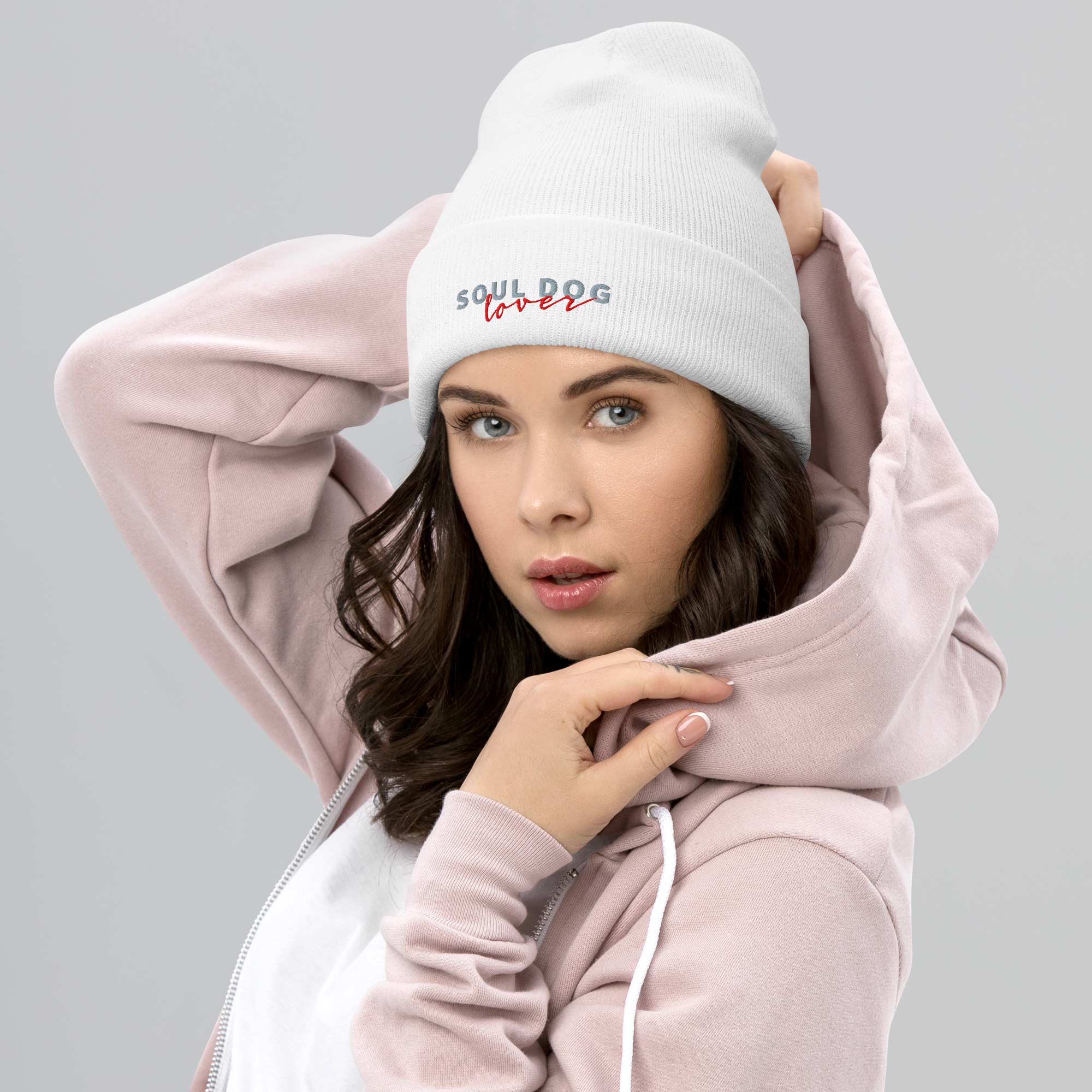 Woman wearing a white Soul Dog Beanie by ZIO.