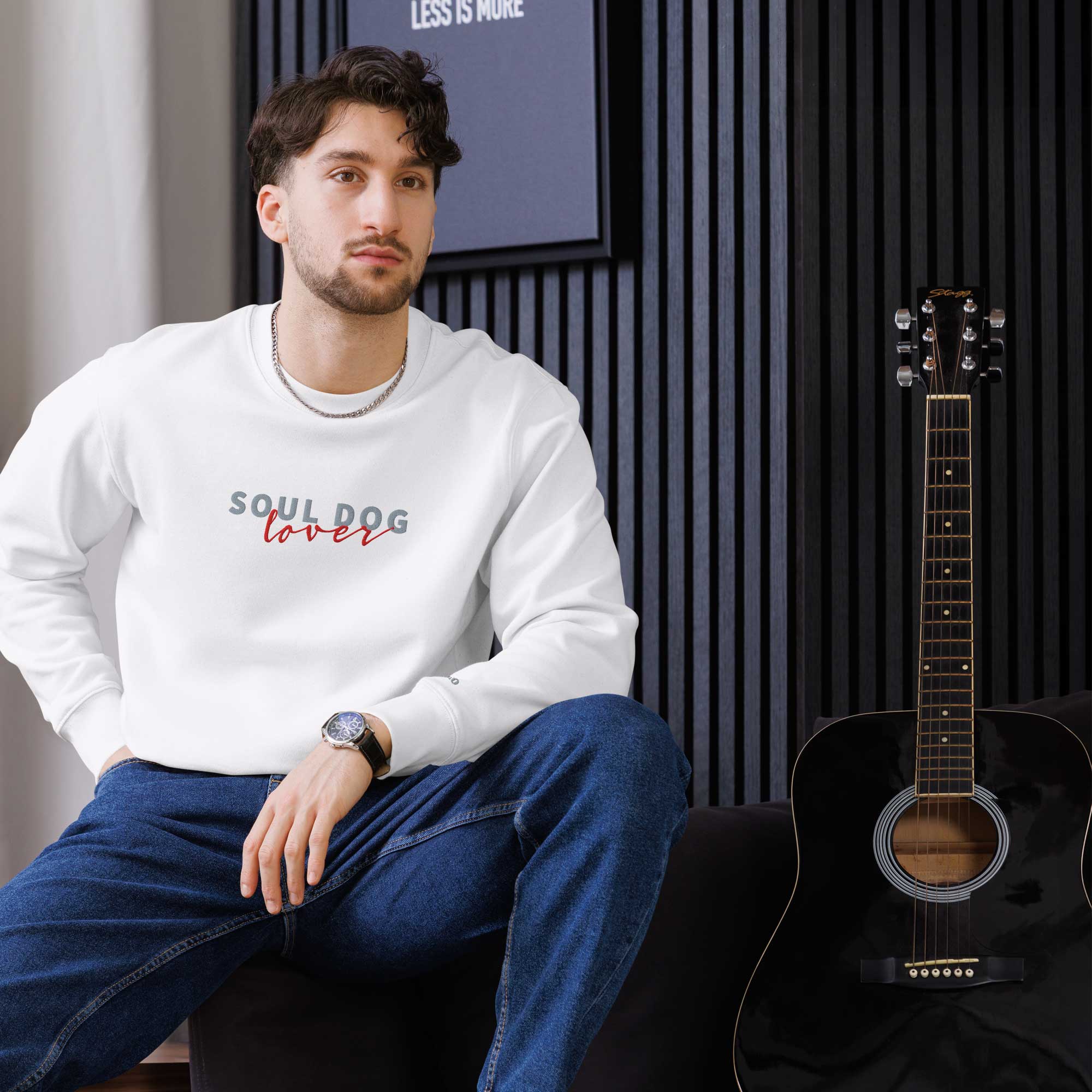 Man wearing a Soul Dog Sweatshirt by ZIO in white, “Soul Dog Lover" embroidered.