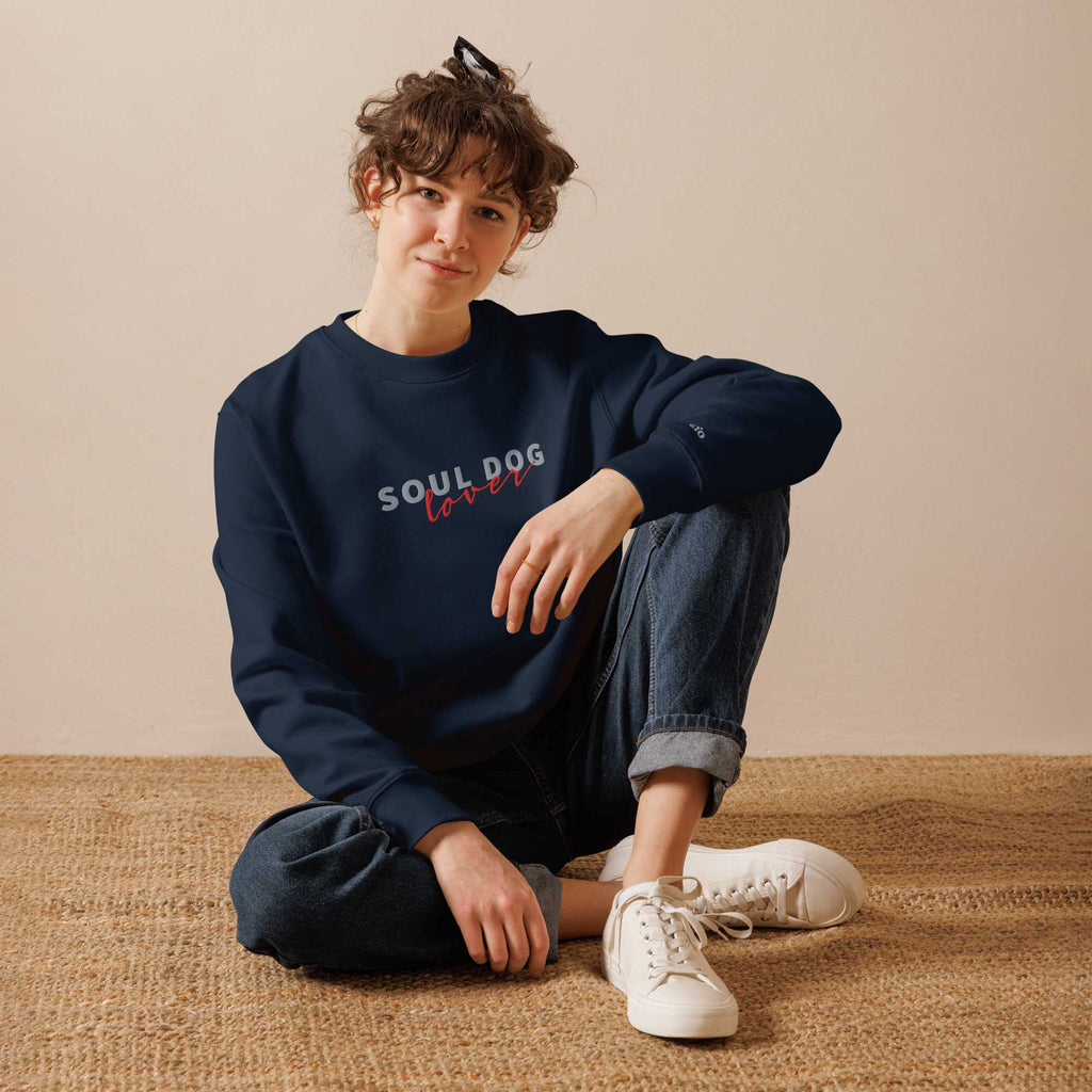 Man wearing a Soul Dog Sweatshirt by ZIO in white, “Soul Dog Lover" embroidered.