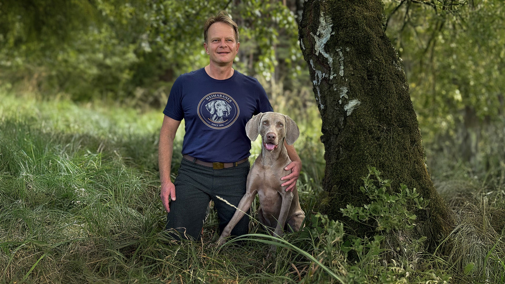 Man with Weimaraner dog wearing a Weimaraner 1896 T-Shirt in Blue by ZIO