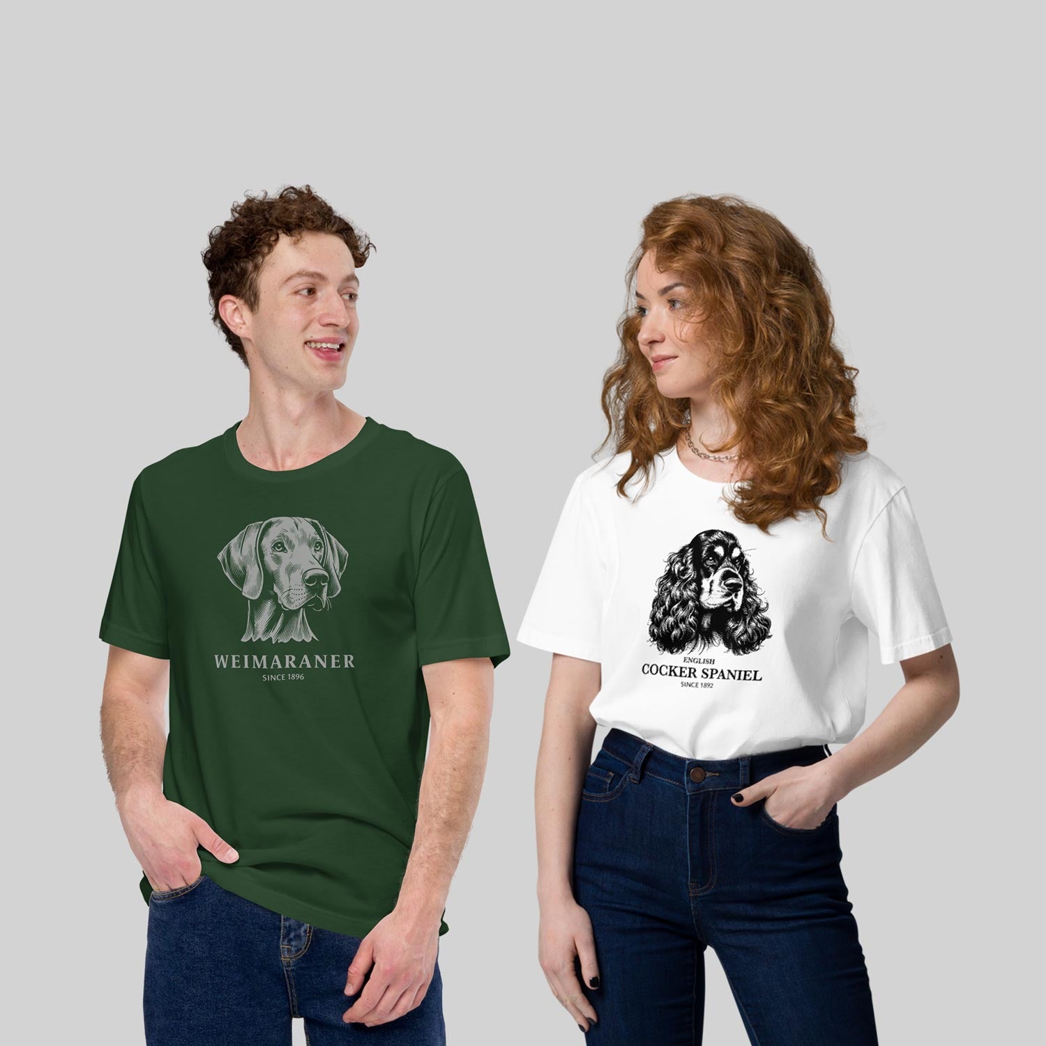 ZIO Dog Breeds Shirts. Man wearing a green Weimaraner T-Shirt, woman wearing a white Cocker Spaniel T-Shirt.